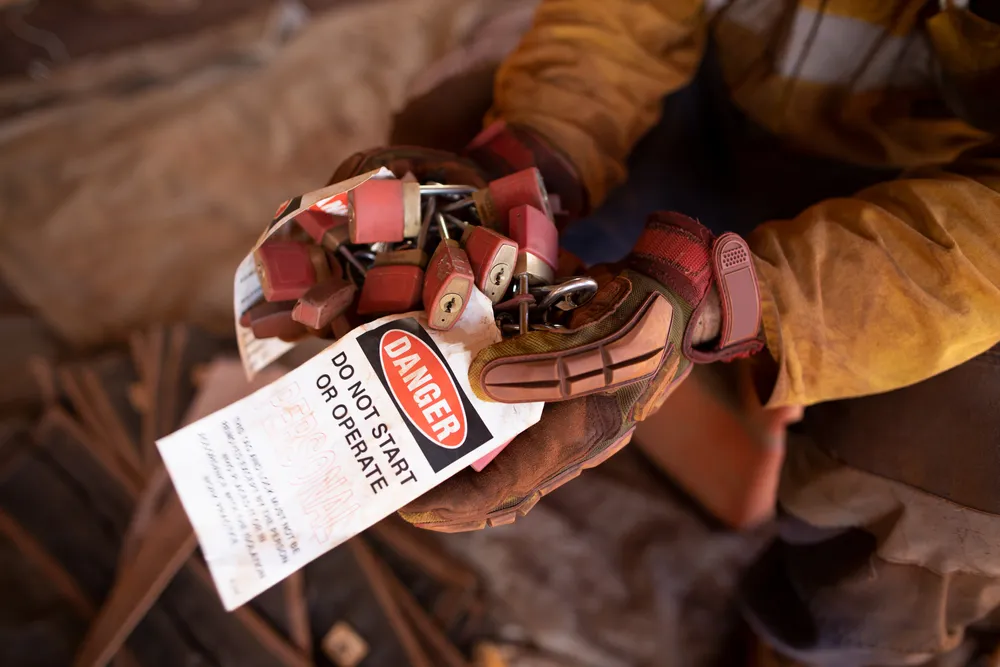 safety,workplaces,construction,worker,holding,inspecting,bunches,of,danger,personal